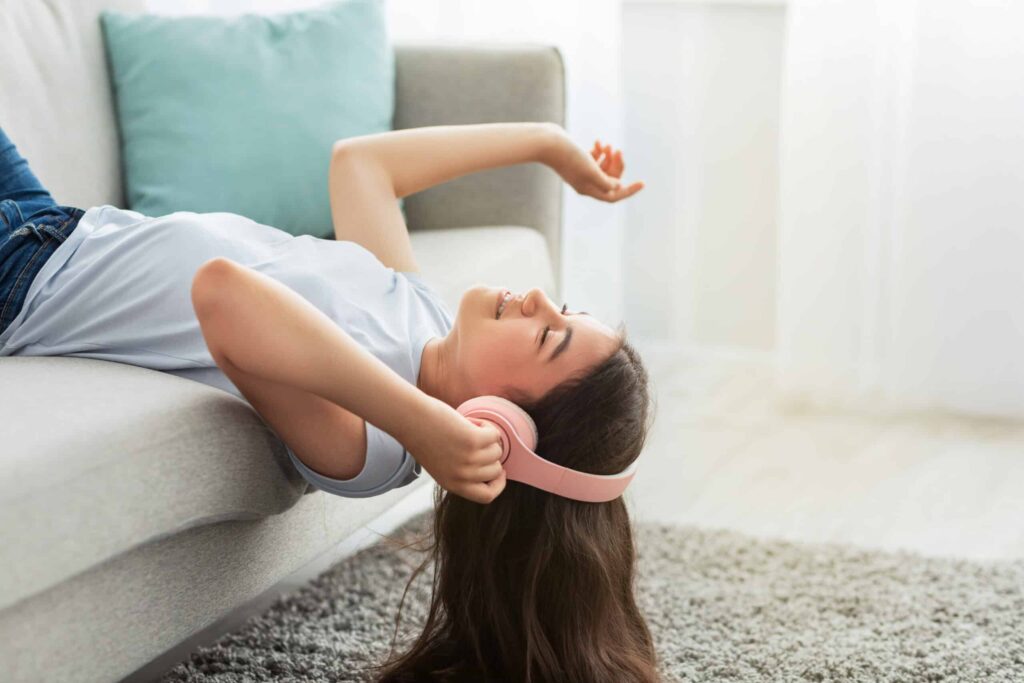 Teen Girl Listening to Music to Cope with Her ADHD and Lying Behaviors