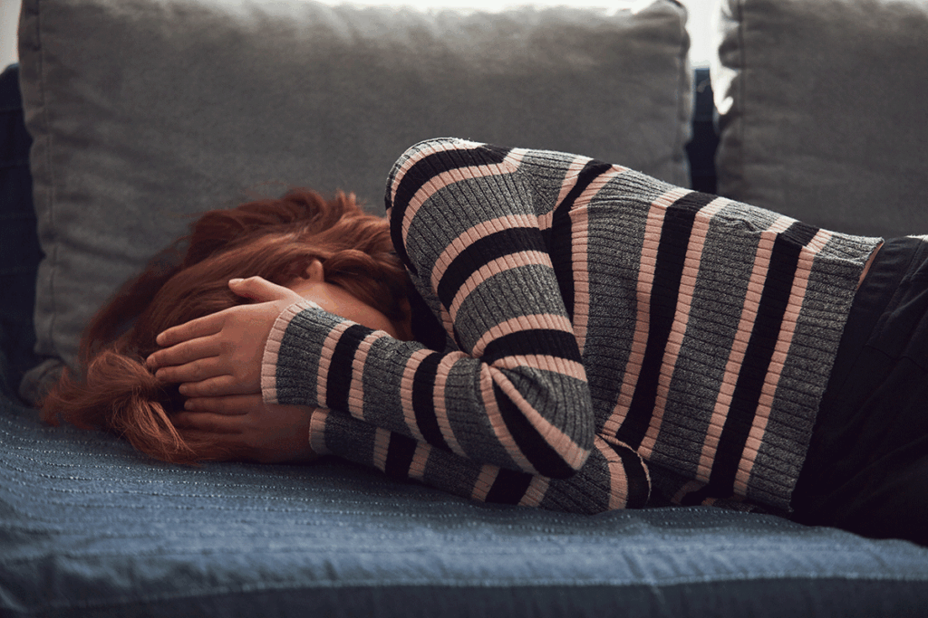 teen laying on the couch experiencing a bpd episode