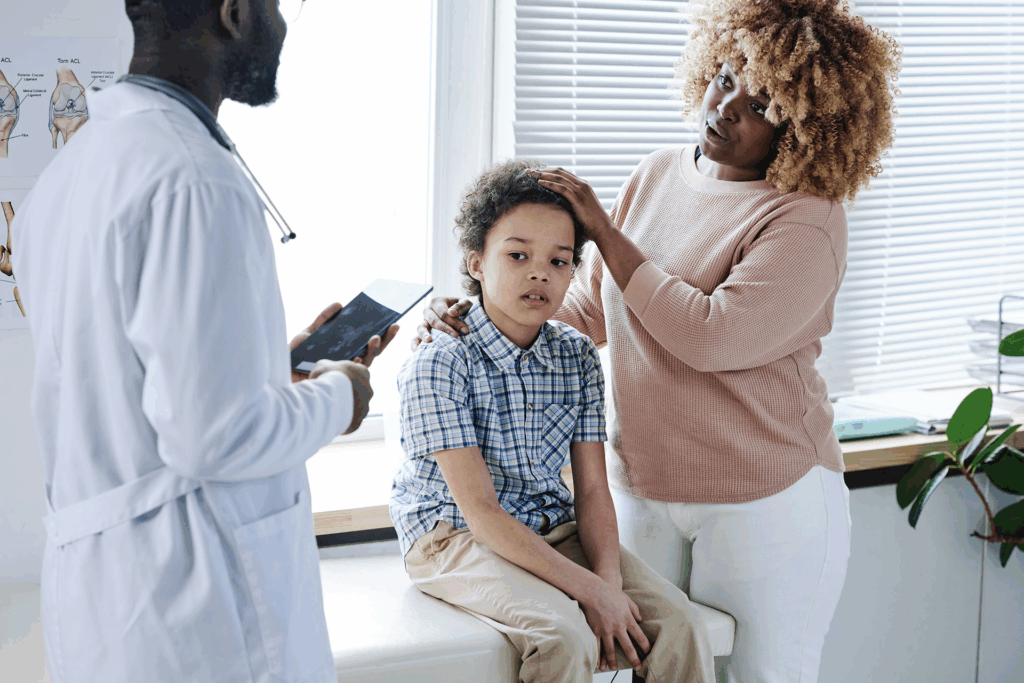 Parent comforting a child showing sudden mood changes after illness, a common sign of PANDAS disorder.